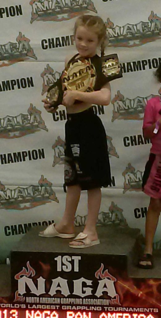 Ava showing off her NAGA championship win