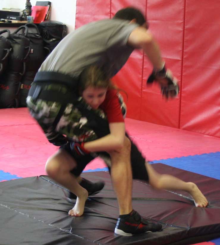 double leg take down demonstration at Mike Price's Martial arts class